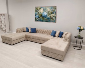 Современный диван с элементами Capitone