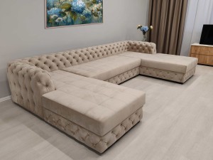 Современный диван с элементами Capitone