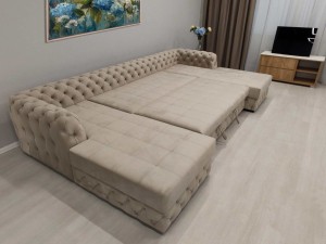 Современный диван с элементами Capitone